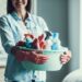 Housekeeper with cleaning supplies