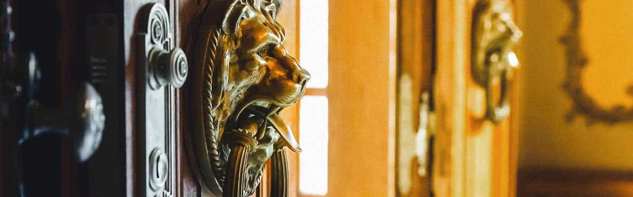 An ornate brass doorknob found on a high net worth home interior doors