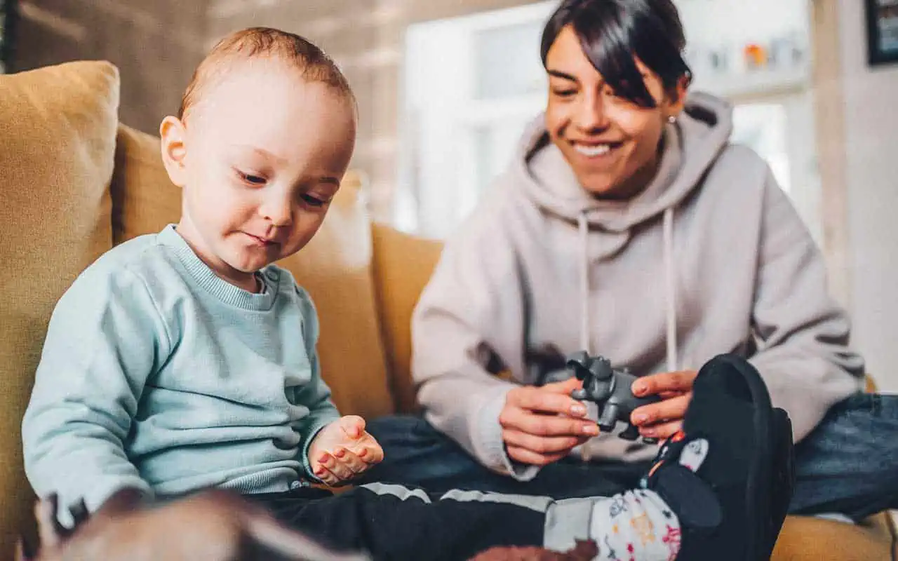 household staffing how much do live in nannies make A nanny plays with a small boy | Household Staffing