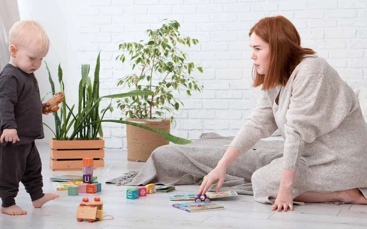 Candidate realizing the consequences of bad or fake job references in a job interview Attentive caregiver observing child's independent play in a prepared environment | Household Staffing