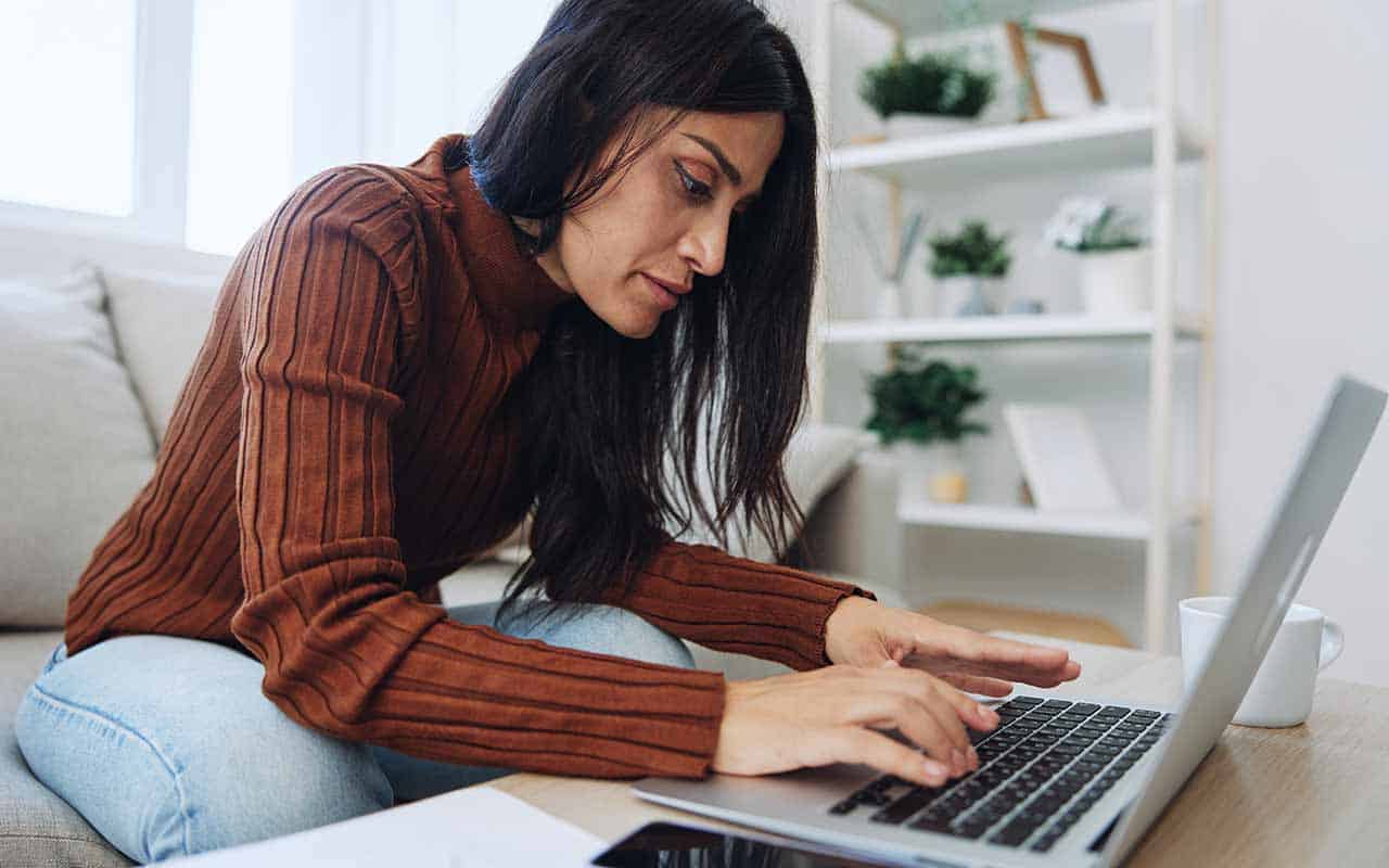 Woman carefully crafting her letters of reference for job applications in a domestic staffing role | Household Staffing