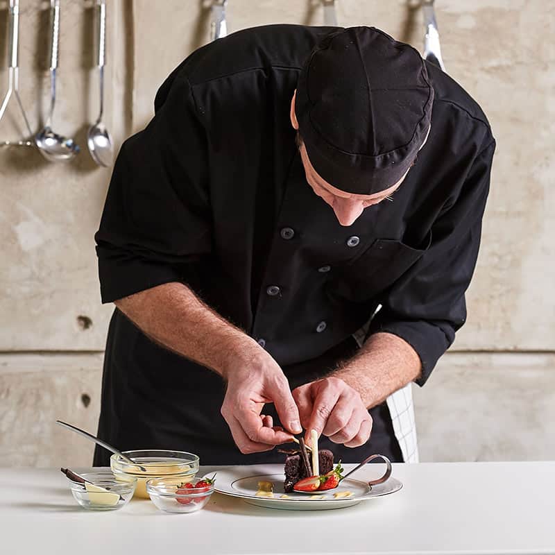 Innovative family office corporate chef crafting a tailored dining experience | Household Staffing